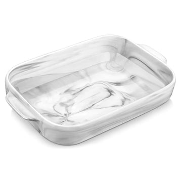 Handled porcelain baking dish with roasted lamb ribs and fresh vegetables