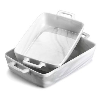 Handled marble grey porcelain baking dishes filled with roasted chicken and seafood