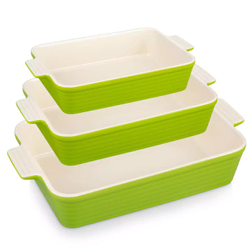 Three green ribbed porcelain baking dishes with cream interiors