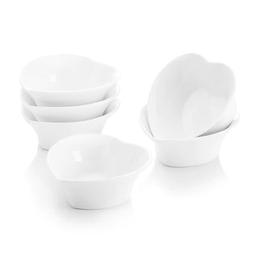 Set of 6 heart-shaped porcelain ramekins with creamy crème brûlée, ideal for desserts and oven-to-table serving #quantity_6