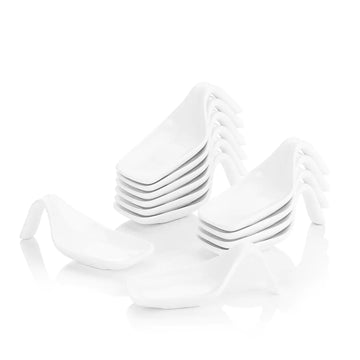 Spoon-shaped dipping bowls holding velvety panna cotta and caramel sauce