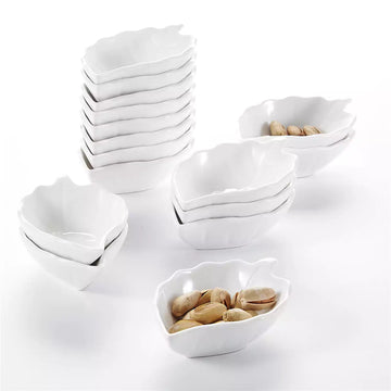 Set of 12 porcelain leaf-shaped ramekin dishes, perfect for serving nuts and small snacks