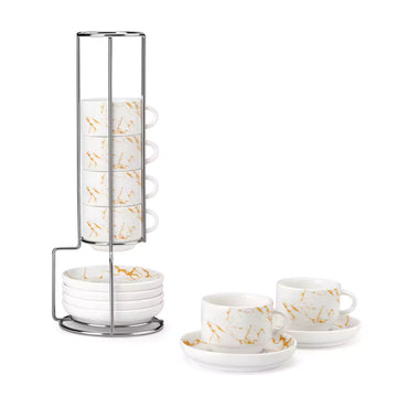 Set of white ceramic cups with gold marbled design on a stand and saucers on a white background#size_3oz