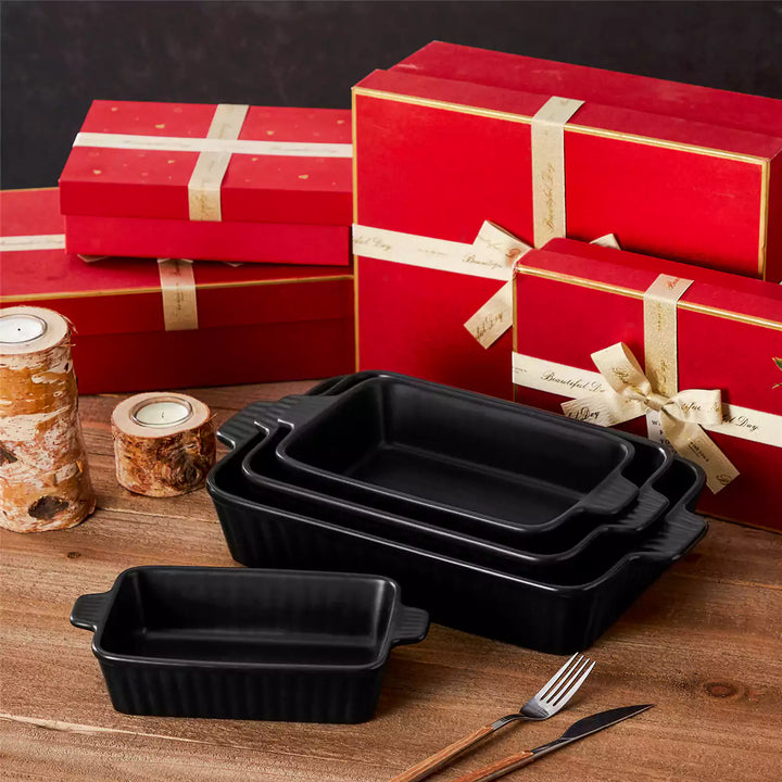 A ceramic baking dish and ramekins set on a kitchen table, showcasing non toxic bakeware ideal as baking gifts for baking lovers.