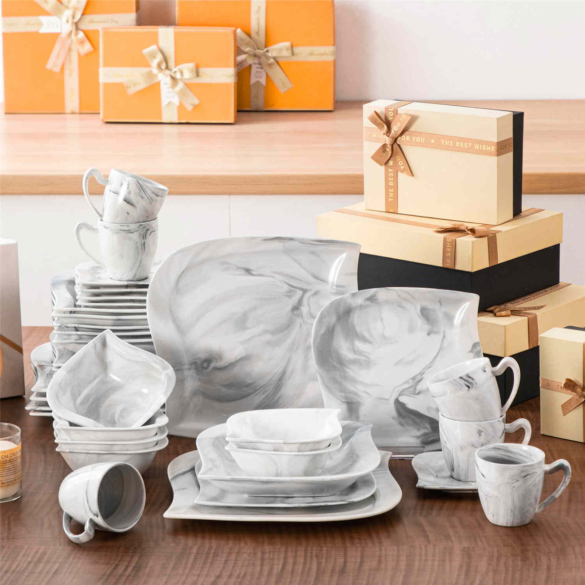 Marble Grey 36-Piece Porcelain Dinnerware Set With Elegant Leaf-Shaped Design And Marble Texture For A Sophisticated Dining Table.
