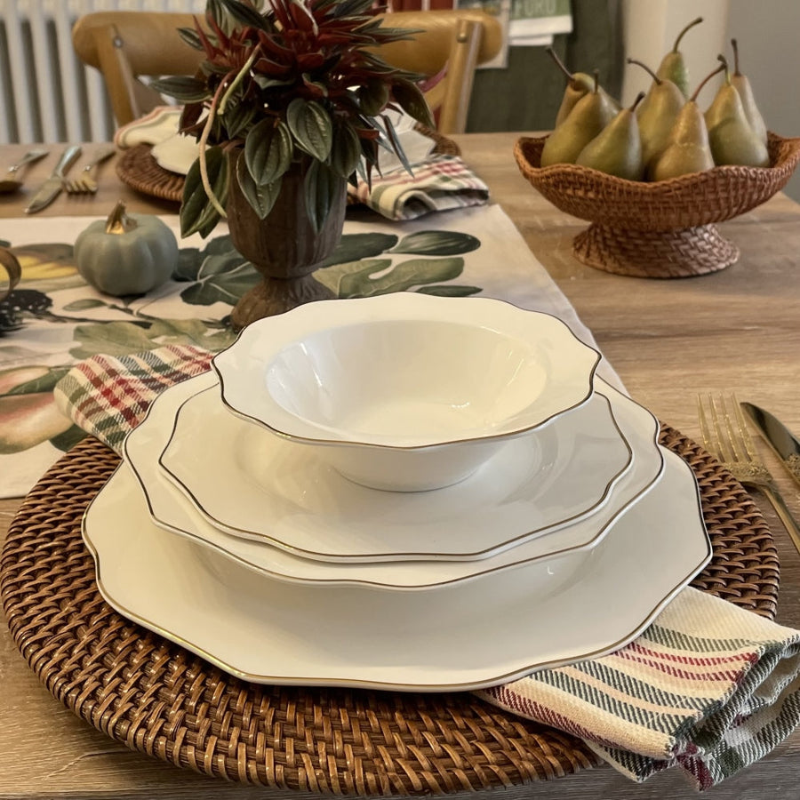 Luxury porcelain dinnerware with balanced shapes, smooth glazes, and coordinated plates, bowls, and cups for an elegant table setting.