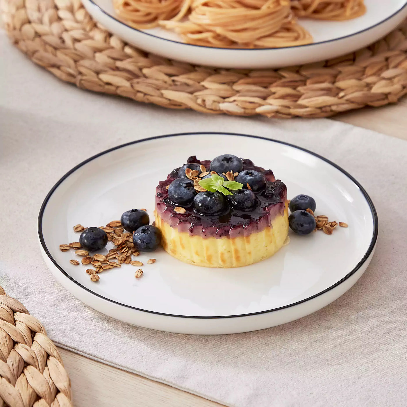 Dessert plates and bowls with cookies, fruit, and ice cream for mindful snacking