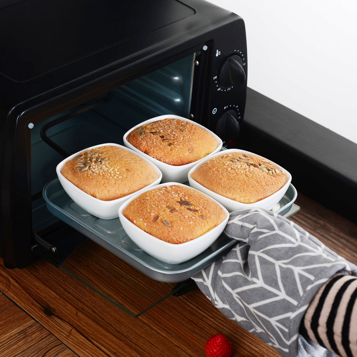 Guide to ramekins vs soufflé dishes, covering materials, sizes, shapes, and uses. Ramekins are versatile; soufflé dishes have straight sides for perfect rising.