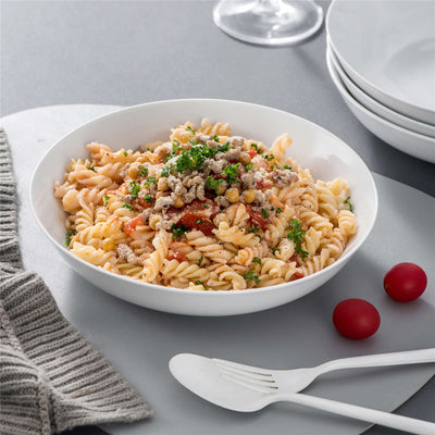 Come impostare la tavola perfetta per una cena di pasta italiana con ciotole per pasta