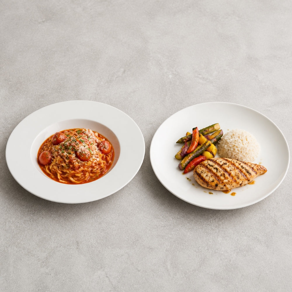 Side-by-side comparison of a rimmed dinner plate and a coupe dinner plate, showing the difference in rim design and usable eating surface.