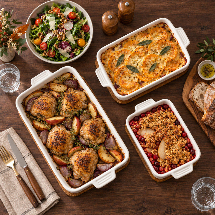Overhead view of an autumn dinner served in TARA ceramic baking dishes.