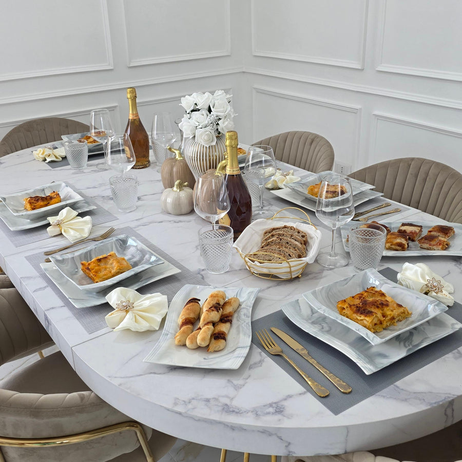 Modern porcelain marble dinnerware set styled on a dining table, featuring elegant marble plates with a luxury stone-inspired look for everyday dining.
