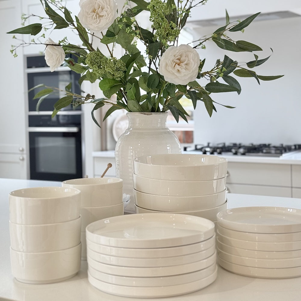 A comparison of straight dinnerware and curved dinnerware showing how different shapes influence modern table settings.
