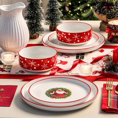 12-piece porcelain Christmas dinnerware set featuring a cheerful Santa Claus design surrounded by playful snowflakes and polka dots, including dinner plates, salad plates, and cereal bowls for four.