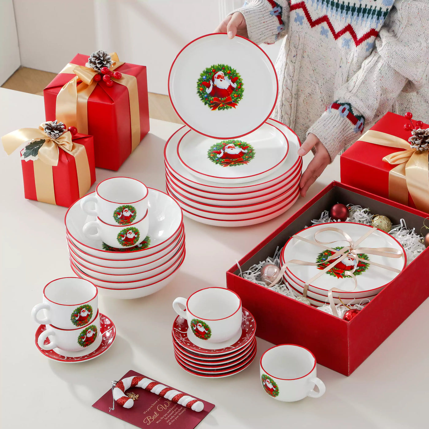 30-piece Christmas porcelain dinnerware set with a joyful Santa Claus motif, snowflakes, and polka dots; includes dinner plates, salad plates, soup plates, cups, and saucers for six guests.