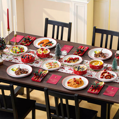 12-piece porcelain dinnerware set from the Christmas Collection, featuring a red Christmas tree topped with a gold star and surrounded by delicate snowflakes; includes plates and bowls for four.