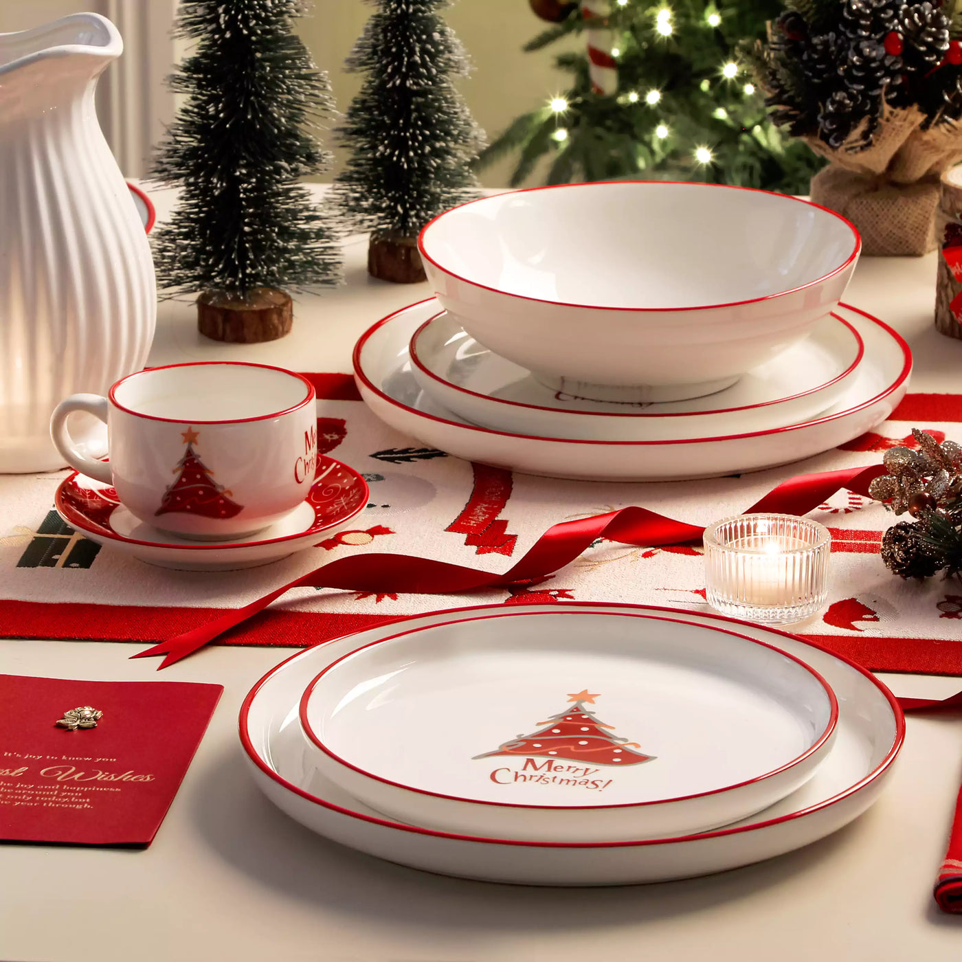 30-piece porcelain Christmas dinnerware set showcasing a red Christmas tree with a gold star and snowflake accents; includes dinner plates, salad plates, soup plates, cups, and saucers for six.