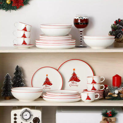 30-piece porcelain Christmas dinnerware set showcasing a red Christmas tree with a gold star and snowflake accents; includes dinner plates, salad plates, soup plates, cups, and saucers for six.