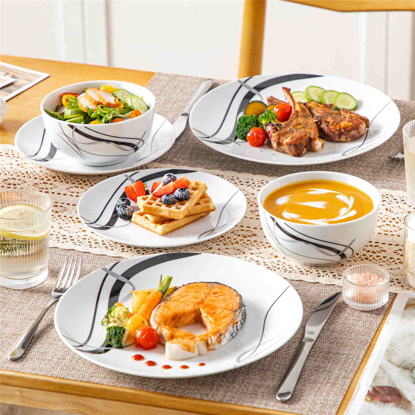 MALACASA Fiona 12-Piece Porcelain Dinnerware Set, Featuring Rounded Design, with Black and Gray Stripes, Includes Plates and Bowls.