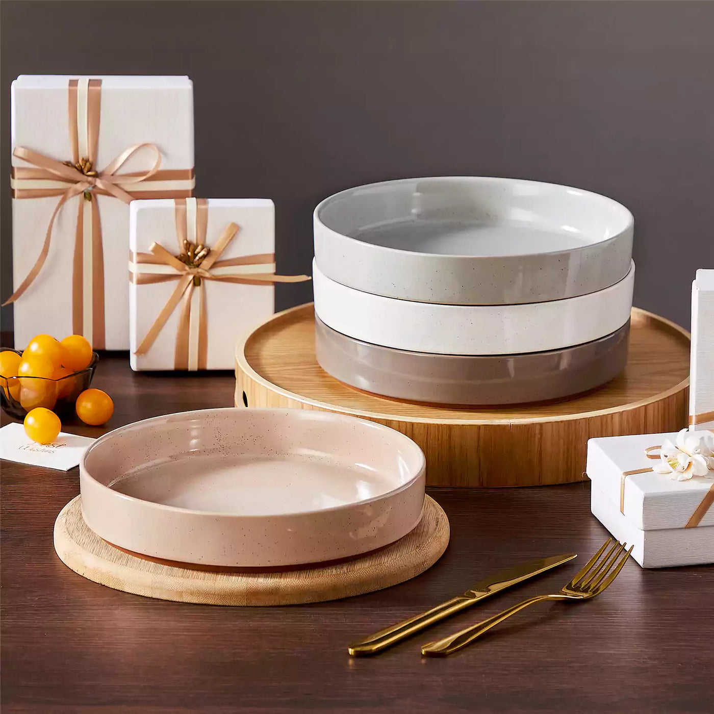 Leah 4-piece stoneware pasta bowls set with speckled glaze, non-slip bases, microwave, oven, and dishwasher safe, available in ivory and multicolor.#color_multicolor