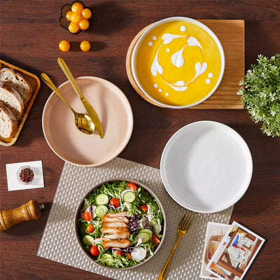 Leah 4-piece stoneware pasta bowls set with speckled glaze, non-slip bases, microwave, oven, and dishwasher safe, available in ivory and multicolor.#color_multicolor