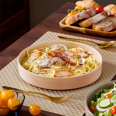 Leah 4-piece stoneware pasta bowls set with speckled glaze, non-slip bases, microwave, oven, and dishwasher safe, available in ivory and multicolor.#color_multicolor