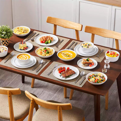 LEXI off-white porcelain dinnerware set including arc-shaped plates with lifted rims and deep rounded bowls#color_white