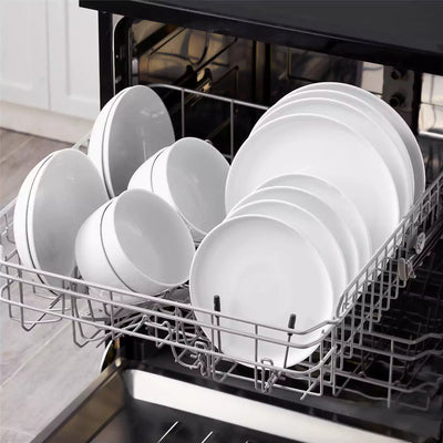 LEXI off-white porcelain dinnerware set including arc-shaped plates with lifted rims and deep rounded bowls#color_white