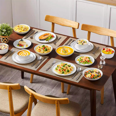 LEXI off-white porcelain dinnerware set including arc-shaped plates with lifted rims and deep rounded bowls#color_black-trim