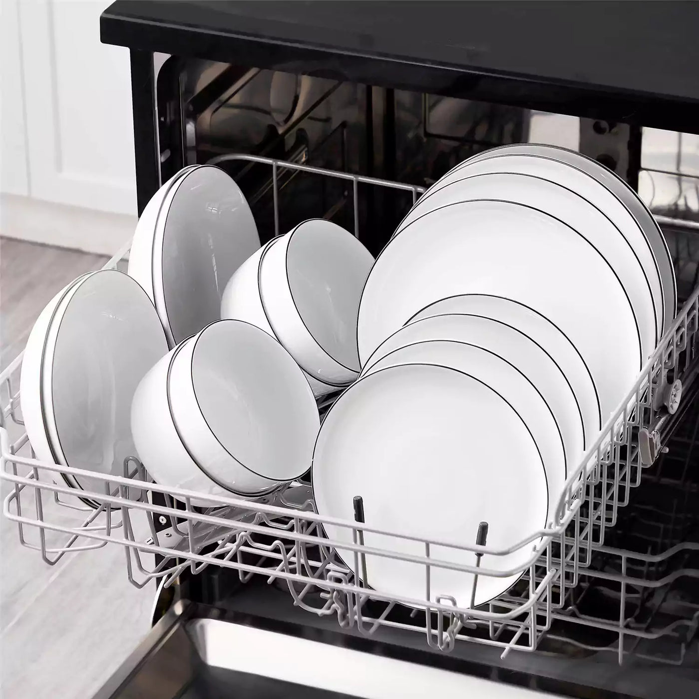 LEXI off-white porcelain dinnerware set including arc-shaped plates with lifted rims and deep rounded bowls#color_black-trim