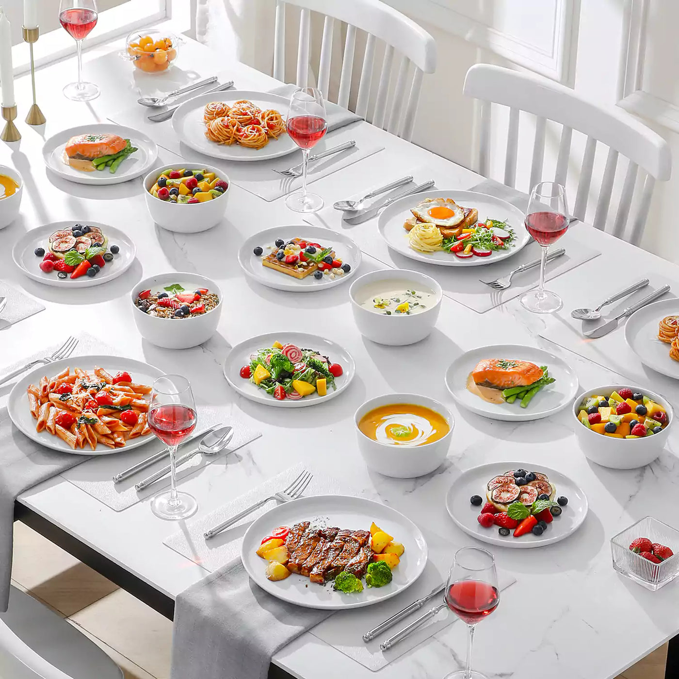 LEXI off-white porcelain dinnerware set including arc-shaped plates with lifted rims and deep rounded bowls#color_white