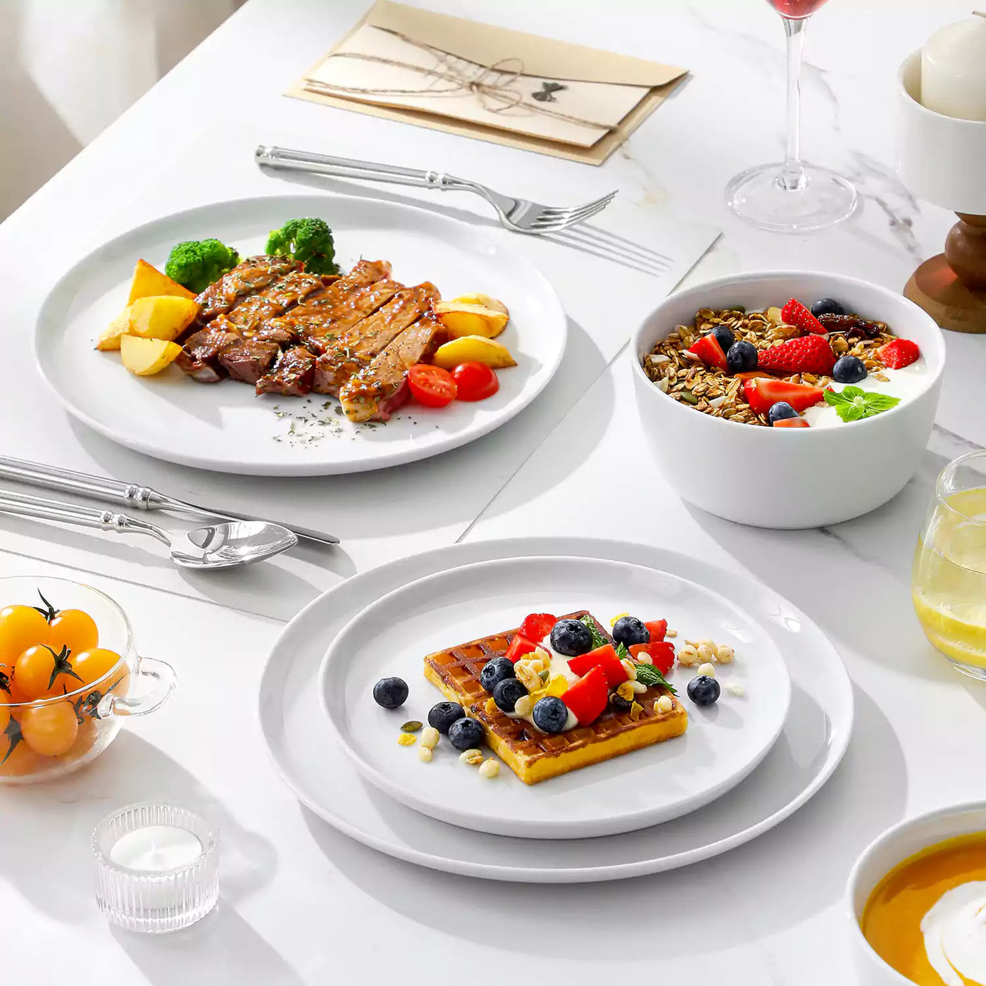 LEXI off-white porcelain dinnerware set including arc-shaped plates with lifted rims and deep rounded bowls#color_white