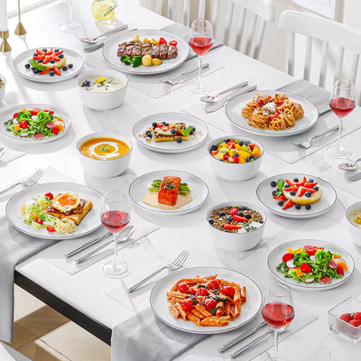 LEXI off-white porcelain dinnerware set including arc-shaped plates with lifted rims and deep rounded bowls#color_black-trim