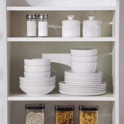 LEXI off-white porcelain dinnerware set including arc-shaped plates with lifted rims and deep rounded bowls#color_black-trim