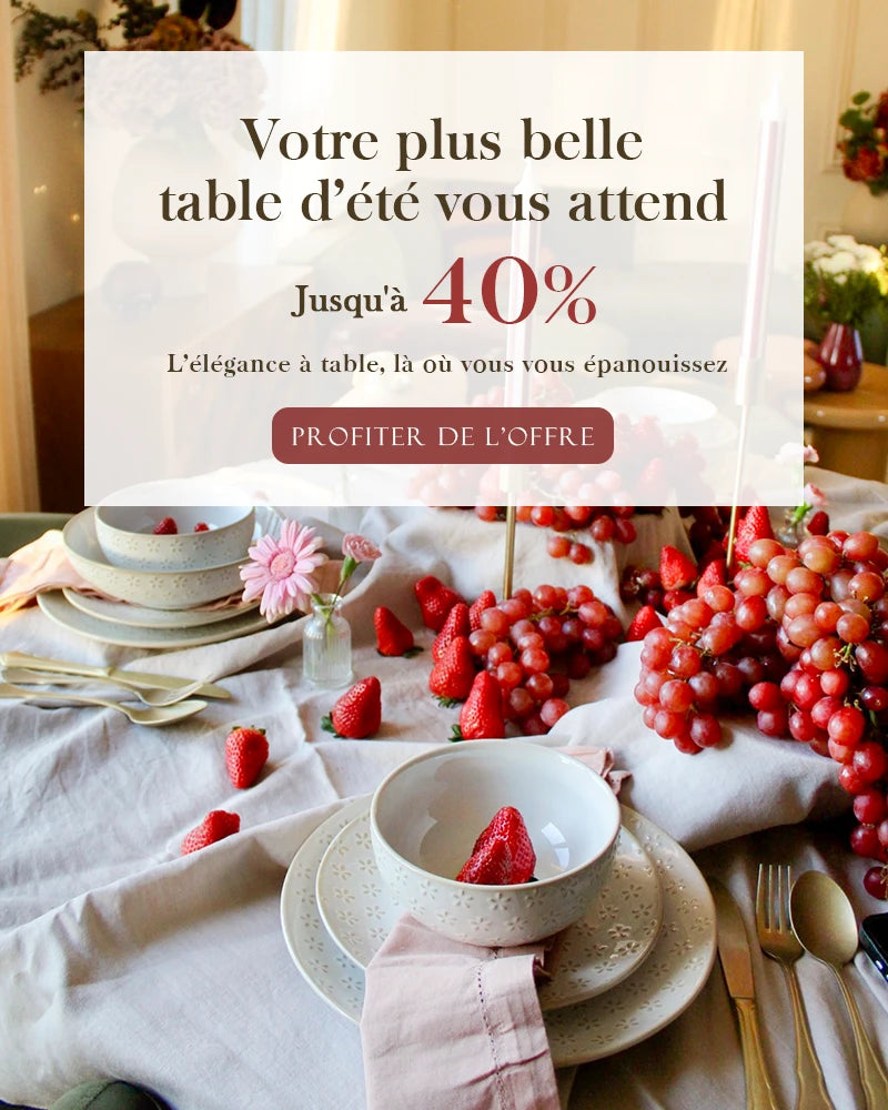 Table setting with strawberries and grapes, promotional text overlay for a summer table sale.