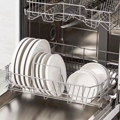 MINA porcelain dinnerware set featuring curved-edge plates and bowls with lifted rims.#color_ivory-white