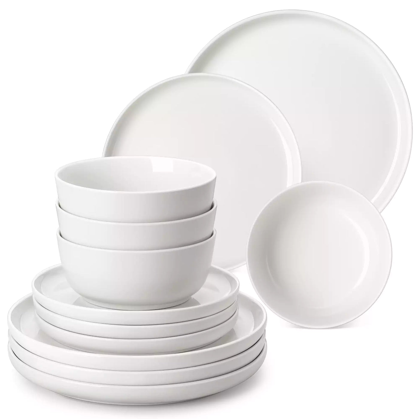 MINA porcelain dinnerware set featuring curved-edge plates and bowls with lifted rims.#color_ivory-white