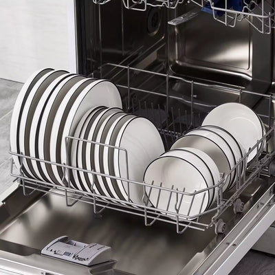 MINA porcelain dinnerware set featuring curved-edge plates and bowls with lifted rims#color_black-trim