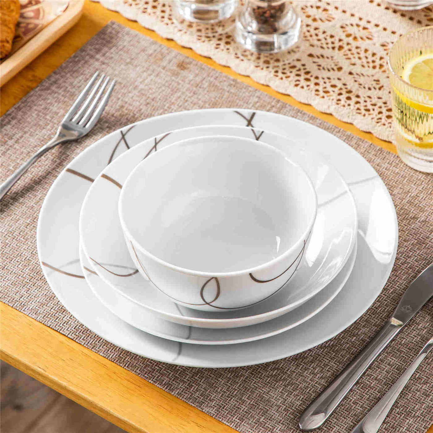 MALACASA Nikita Round 24-Piece Dinnerware Set, Featuring Rounded Design with Brown Line Pattern, Includes Soup Bowl and Plate.