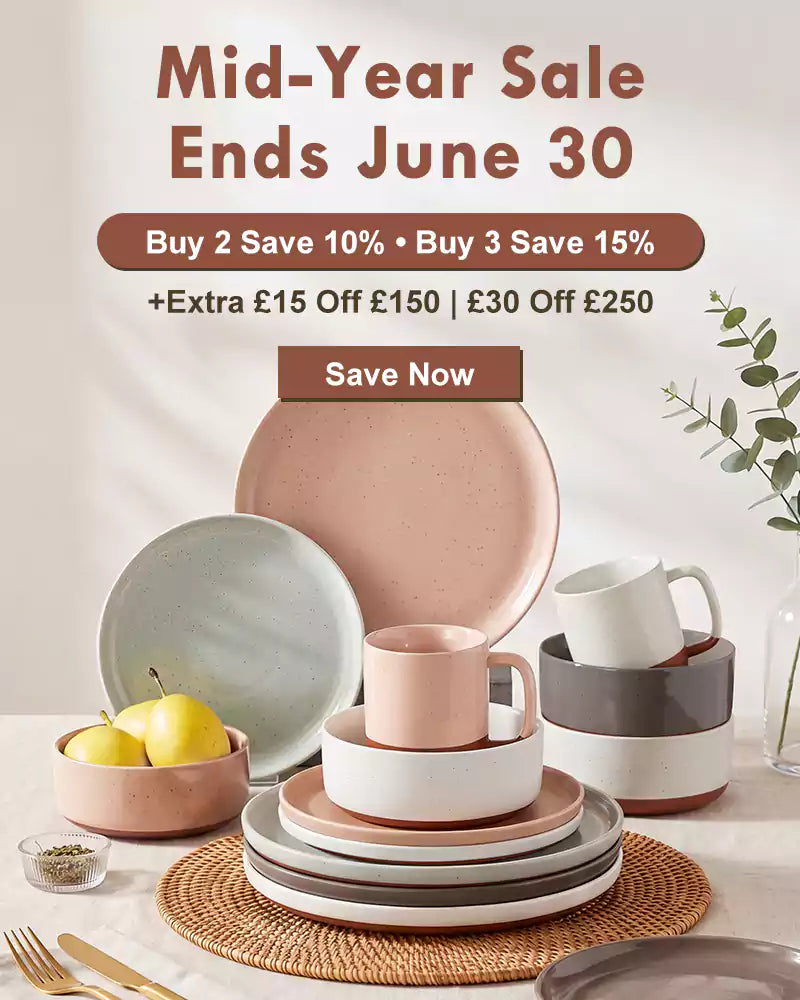 Dining set with plates, cups, and bowls on a table with promotional text for a mid-year sale.