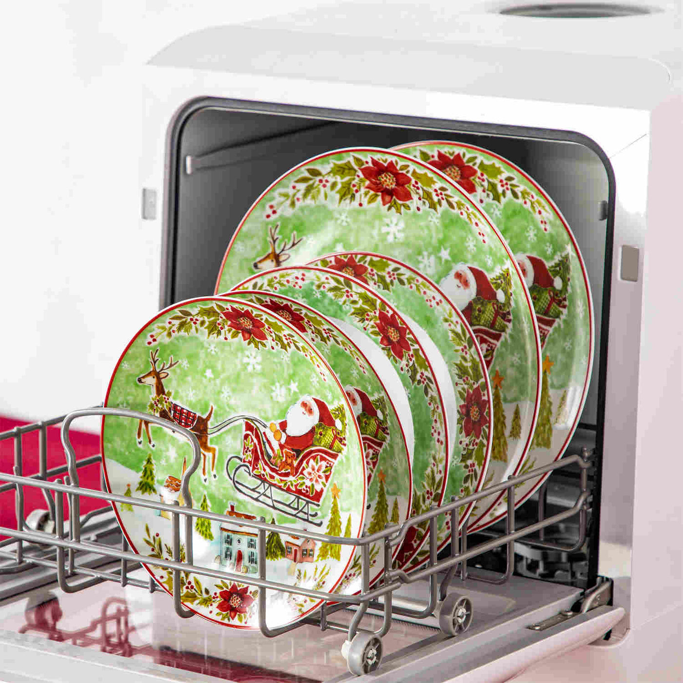 Celebrate the season with MALACASA Xmas Reindeer Sleigh 18 Piece Porcelain Dinnerware Set for 6, featuring dinner, salad, and soup plates adorned with festive red and green reindeer designs!